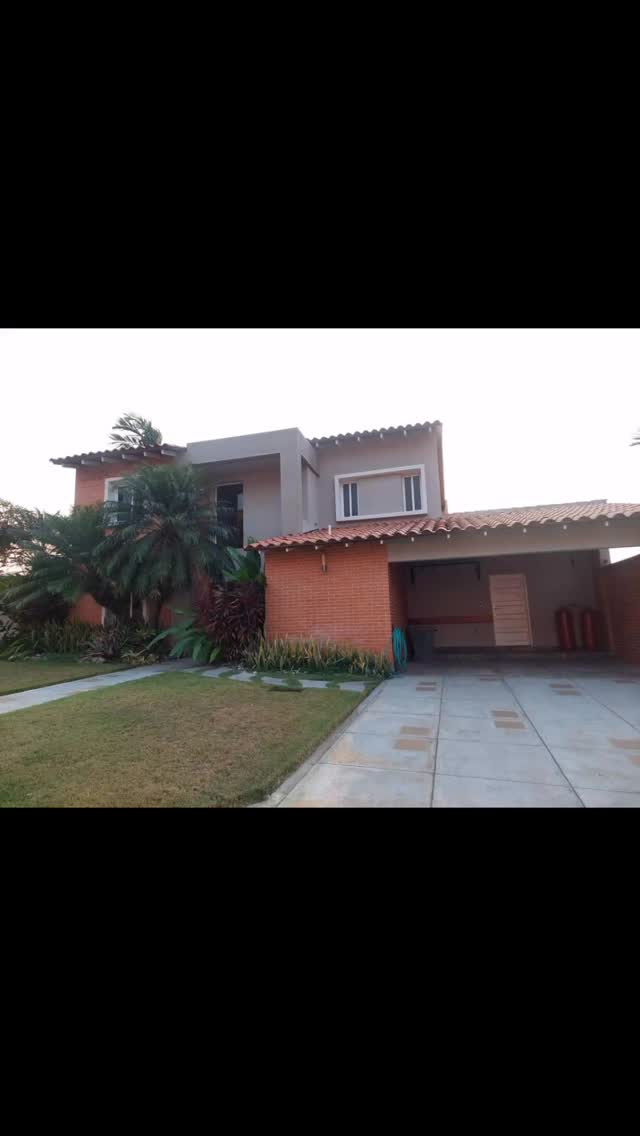 Casa de esquina con vista al dique en Lomas Del Country - Imagen 1